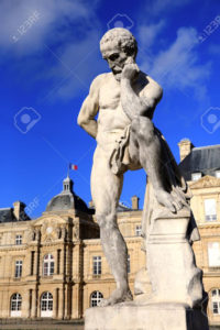 statue of the thinker man in front of the french senate at the